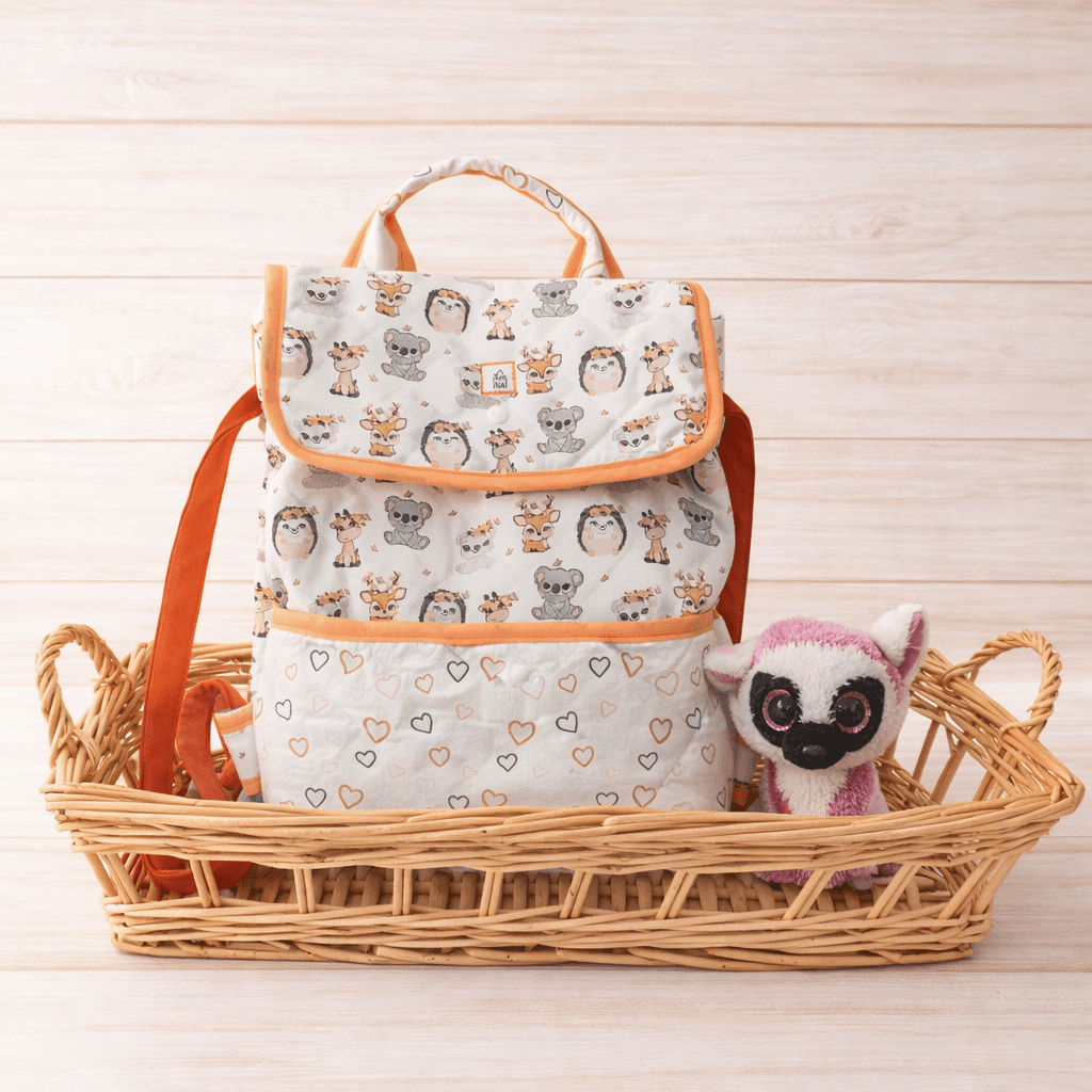 zainetto per bambini in tessuto fatto a mano con tasche e fantasia animaletti