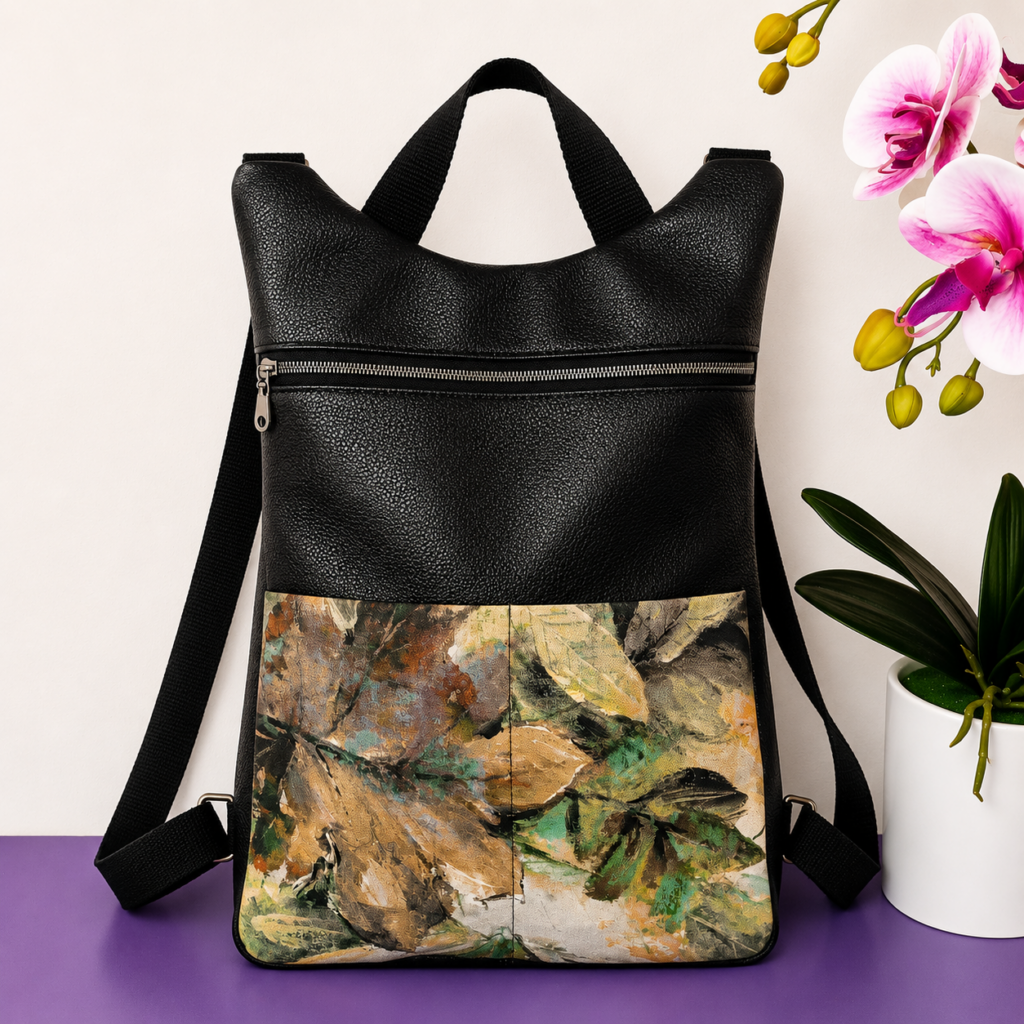 Zaino donna nero con tasca frontale fantasia foglie artistiche multicolore e finitura effetto pelle